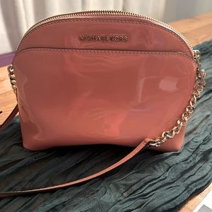 Pink Michael Kors over the shoulder handbag